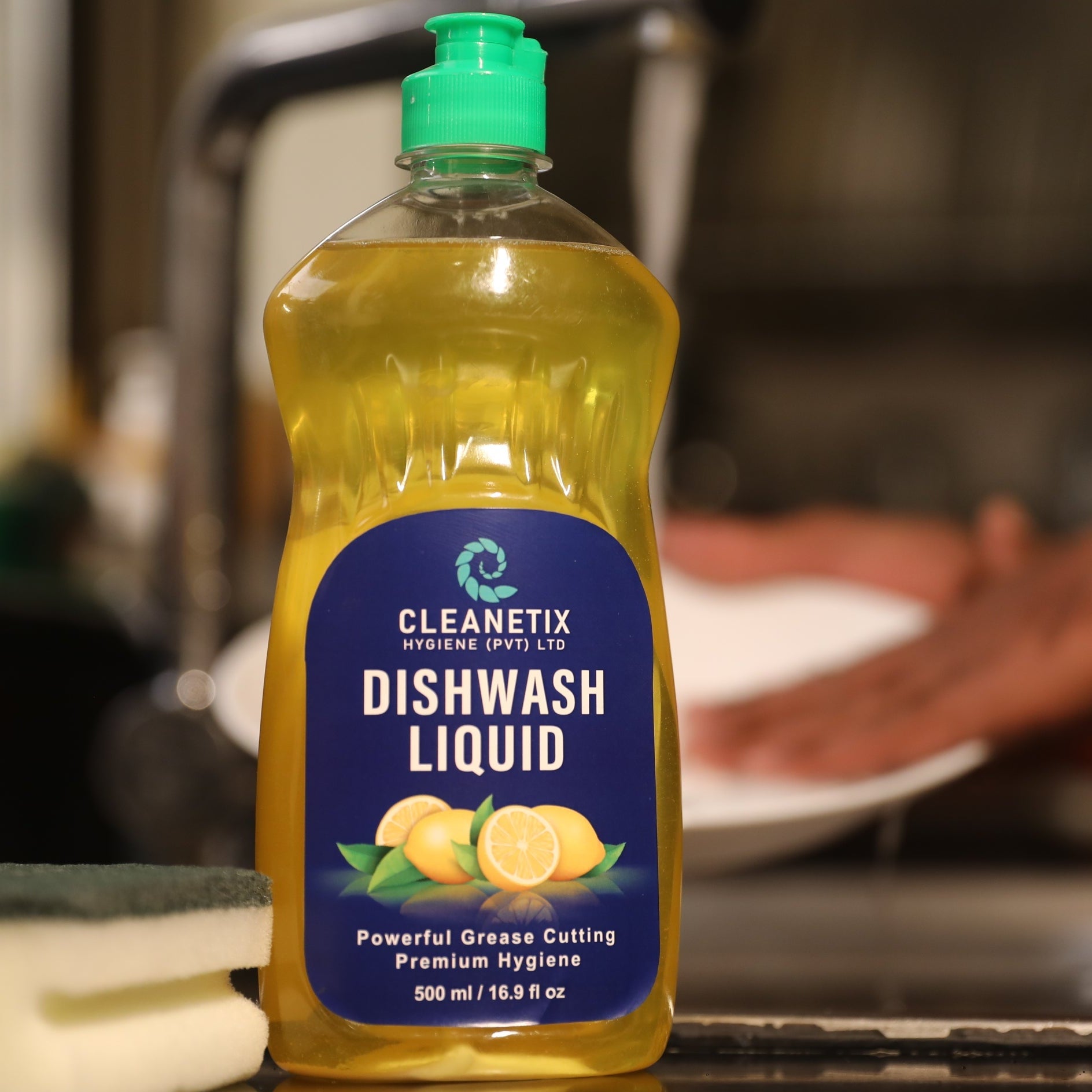 Bottle of Cleanetix dishwash liquid with a blue label on a kitchen counter.